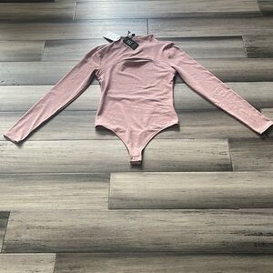 Express Body contour bodysuit XS Mock Neck Cutout Long Sleeve Pink Thong